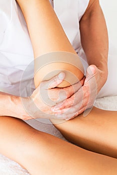 Massages on womanÂ´s leg