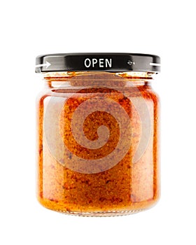 Massaman curry paste in glass jar photo