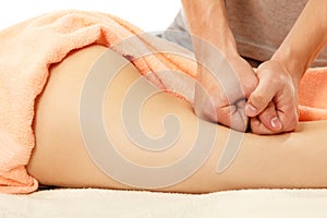 Masseur makes anticellulite massage young woman isolated on whit photo