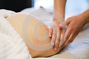 masseur makes anticellulite massage young woman in the spa salon. Body care concept. Special anticellulite treatment.