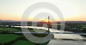 Massive bridge over the Suir River against the sunset 4k