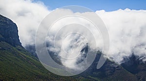 Massive clouds on a mountain