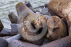 Massive concrete breakwaters to protect the coast from the destructive effects of sea waves