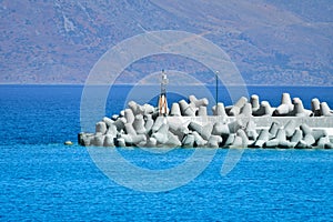 Massive concrete tetrapods form a breakwater