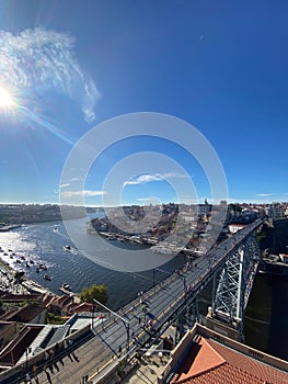 Massive crossing bridge over the Douro river in Porto, Portugal skyline cityscape scene