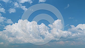 Massive cumulus clouds. Cloudy weather in air of heaven. Fluffy white cloud and puffy cumulus or cumulonimbus cloudscape