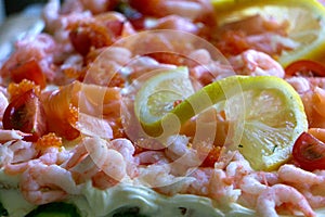 close up of toppings on massive decorative swedish Smorgas-cake photo