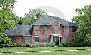 Massive Federal Red Brick House with Bushes