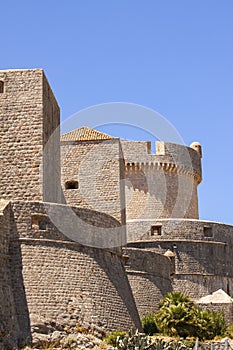 The massive fortress walls and fortified towers of Dubrovnik