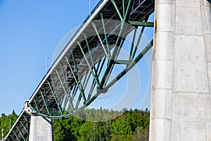 Massive industrial steel and cement construction structure of the bridge