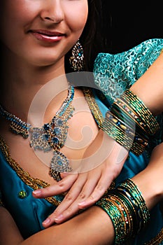 Massive jewelry on female body in indian dress