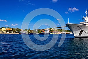 Massive luxury yacht docked near bridge on Curacao