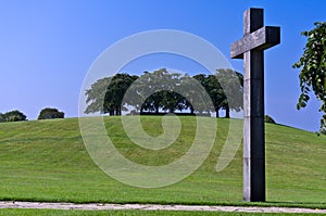 A massive religious cross on a blue sky