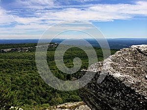 Massive rocks and view to the valley at Minnewaska State Park