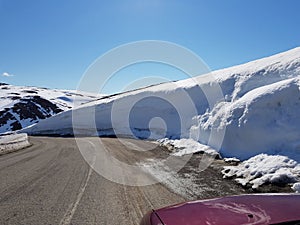 Massive snow walls on a mountain overpass in northern Norway, Magerisland Finnmark