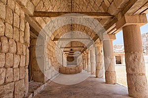 Massive stone columns at Uxmal Mexico