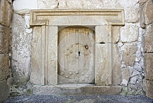 Massive stone door