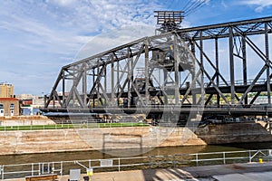 Massive swing span of Arsenal Bridge opens over river lock