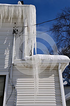 Massive two story long icicle