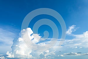 Massive white clouds in the daytime sky