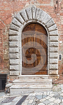 Massive wooden doors typical of southern Italy