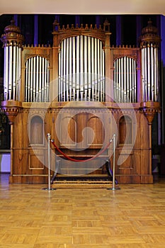 Massive wooden pipe old organ with metal pipes