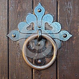 Massy iron door knocker