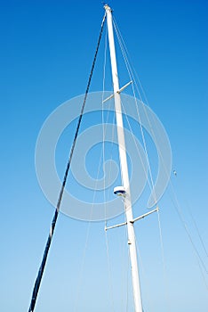 Mast in blue sky, transportation, sports