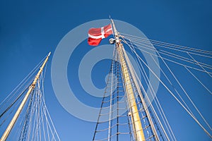 Mast and Danish flag on a large sailing