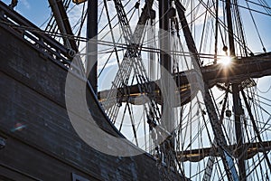 Mast and folded sails of an old galleon