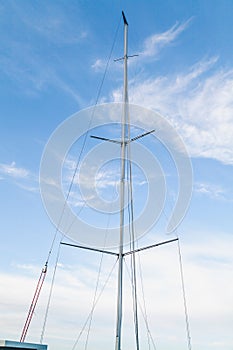 Mast yacht in the background of the sky