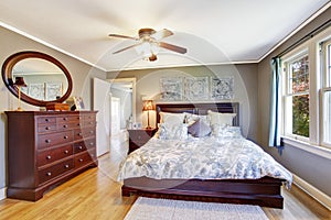 Master bedroom interior with walk-in closet