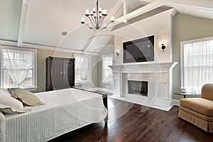 Master bedroom with marble fireplace