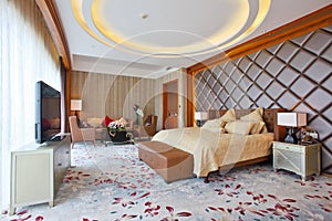 The master bedroom of the presidential suite in a Five-star hotel at the day time