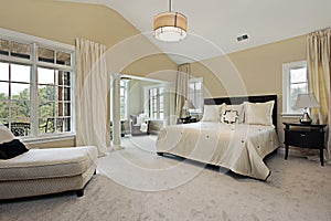 Master bedroom with sitting room photo