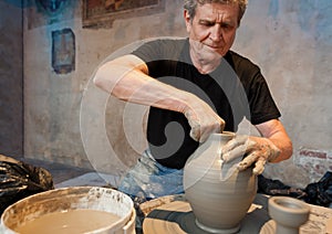 Master of clay at work on the pottery wheel