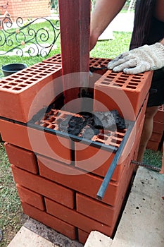 The master at the construction site is laying a brick laying