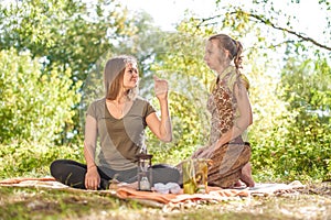 Master massage therapist performs a relaxing massage in nature.