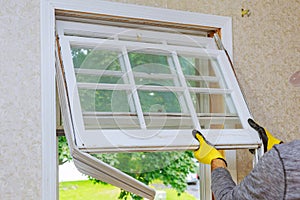 Master removes old home repairs, replacement windows photo