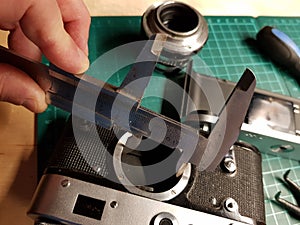 Master repairing an old camera