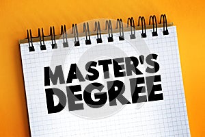 Master`s Degree text quote on notepad, concept background