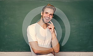 Master of simplification. Man teacher in front of chalkboard. Back to school. Advantages for male elementary teacher are