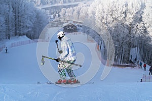 Master Skier skiing down the hill, winter day, Moscow region, Russia