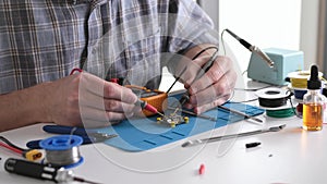 Master Is Testing Electrical Circuit Using Multimeter