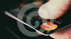 Mastercard in hand