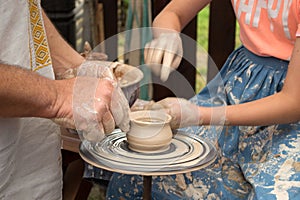 Masterclass of clay pot production on potter`s wheel
