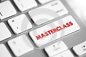 Masterclass text button on keyboard, concept background photo
