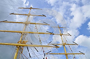 Masting of big wooden sailing ship, detailed rigging without sails