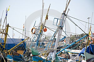 Masts of fishing sailboats at Moti Daman jetty in Daman, India