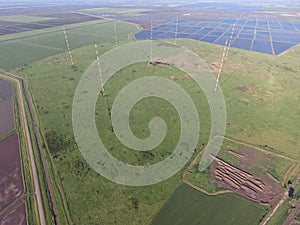 Masts longwave antennas communication among the rice fields flooded